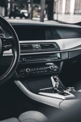 Dashboard and air conditioning vent in European car.