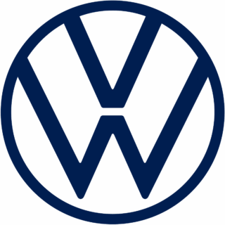 The image shows the Volkswagen logo, consisting of a stylized "V" over a "W" enclosed in a circular border, rendered in dark blue—a symbol recognized wherever quality Volkswagen Servicing is offered.
